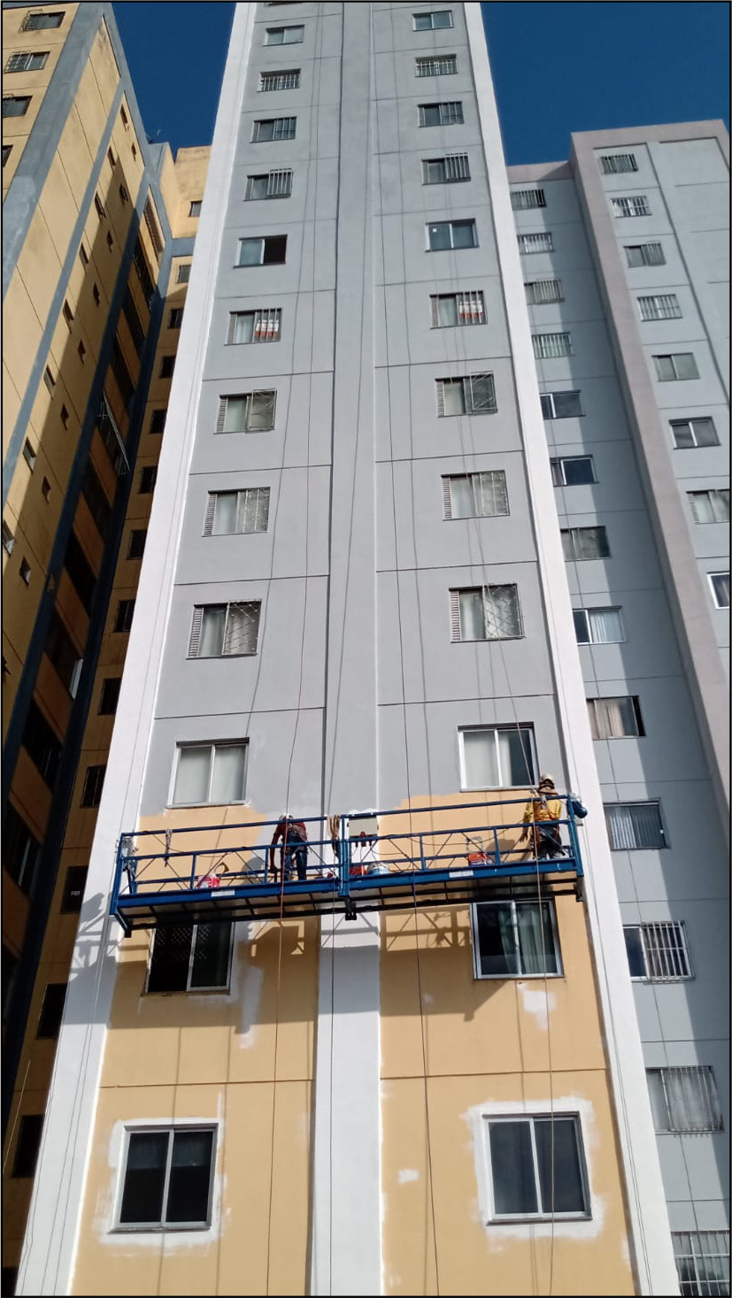 Aplicação de acabamento Ecogranito em fachada